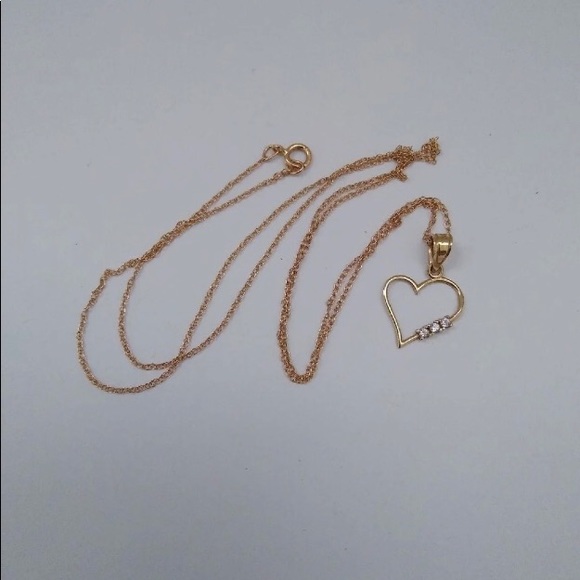Dainty necklace. 14k gold chain with dainty 10k heart charm. 3 tiny diamonds. - Picture 4 of 5